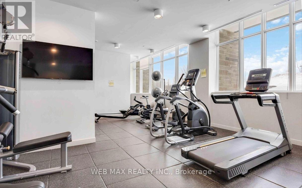 911 - 10 Deerlick Court, Toronto, ON - Indoor Photo Showing Gym Room