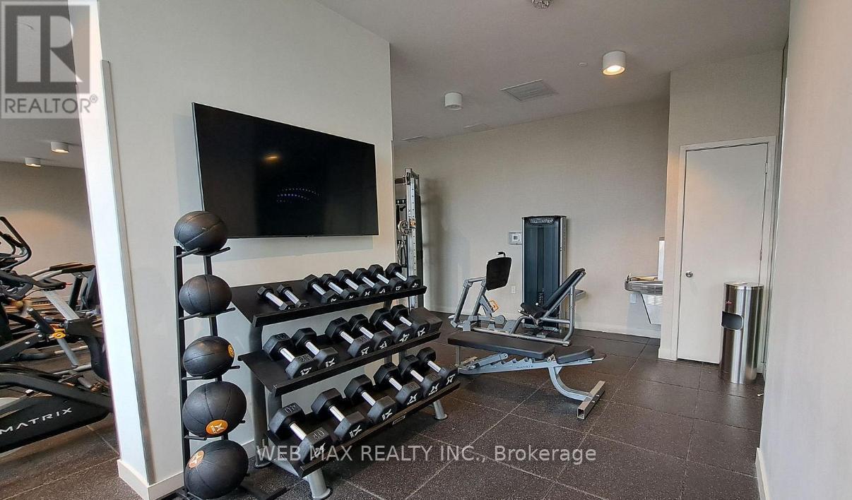 911 - 10 Deerlick Court, Toronto, ON - Indoor Photo Showing Gym Room