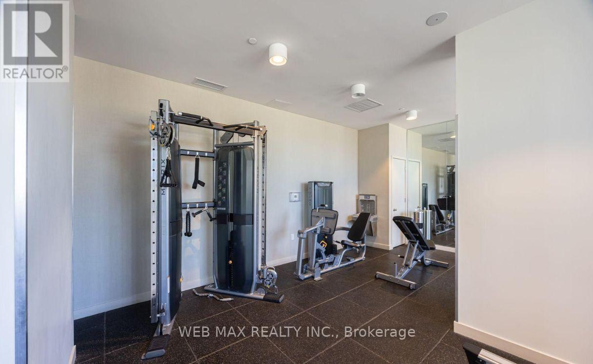 911 - 10 Deerlick Court, Toronto, ON - Indoor Photo Showing Gym Room