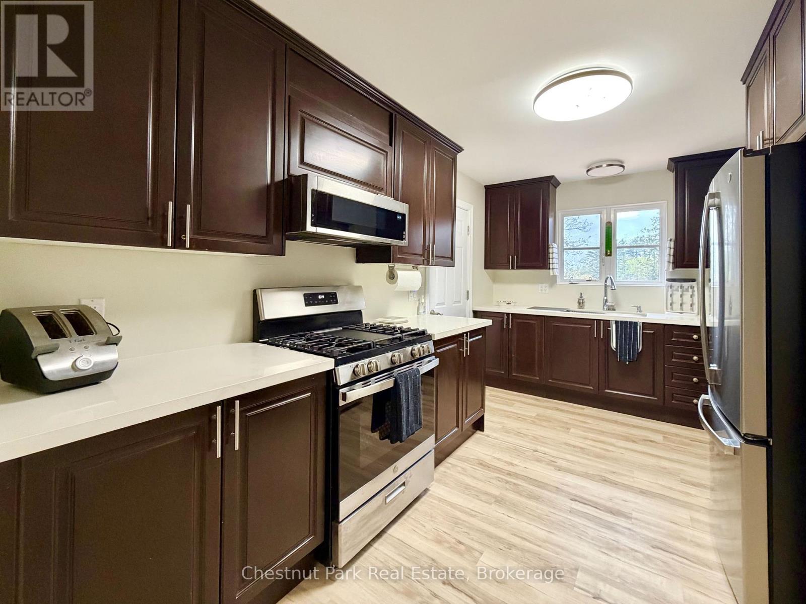 A ton of counter and cupboard space with... - 9211 118 Highway, Minden Hills (Minden), ON