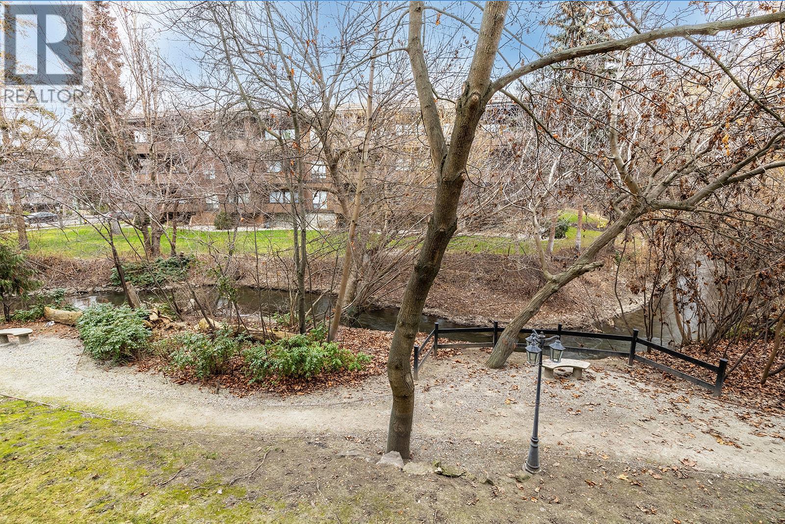 Patio overlooking Mill Creek - 1965 Pandosy Street Unit# 103, Kelowna, BC