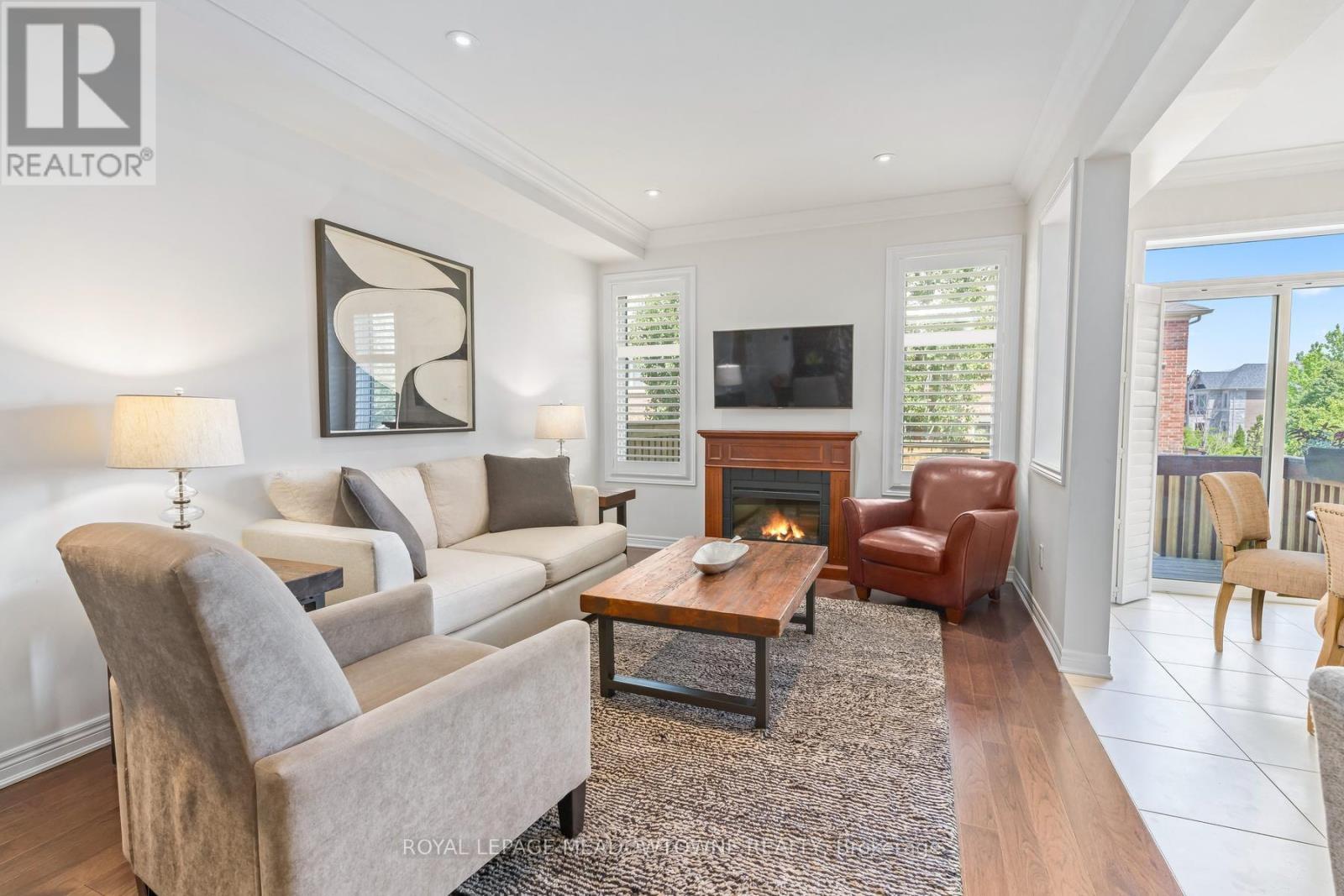 45 Rain Forest Lane, Halton Hills, ON - Indoor Photo Showing Living Room With Fireplace