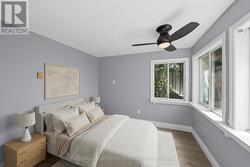 Back bedroom (virtually staged). -