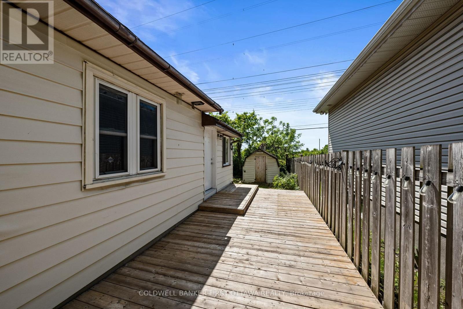 Full deck on right side of home leading to byard. - 1246 Kitchener Avenue, Ottawa, ON