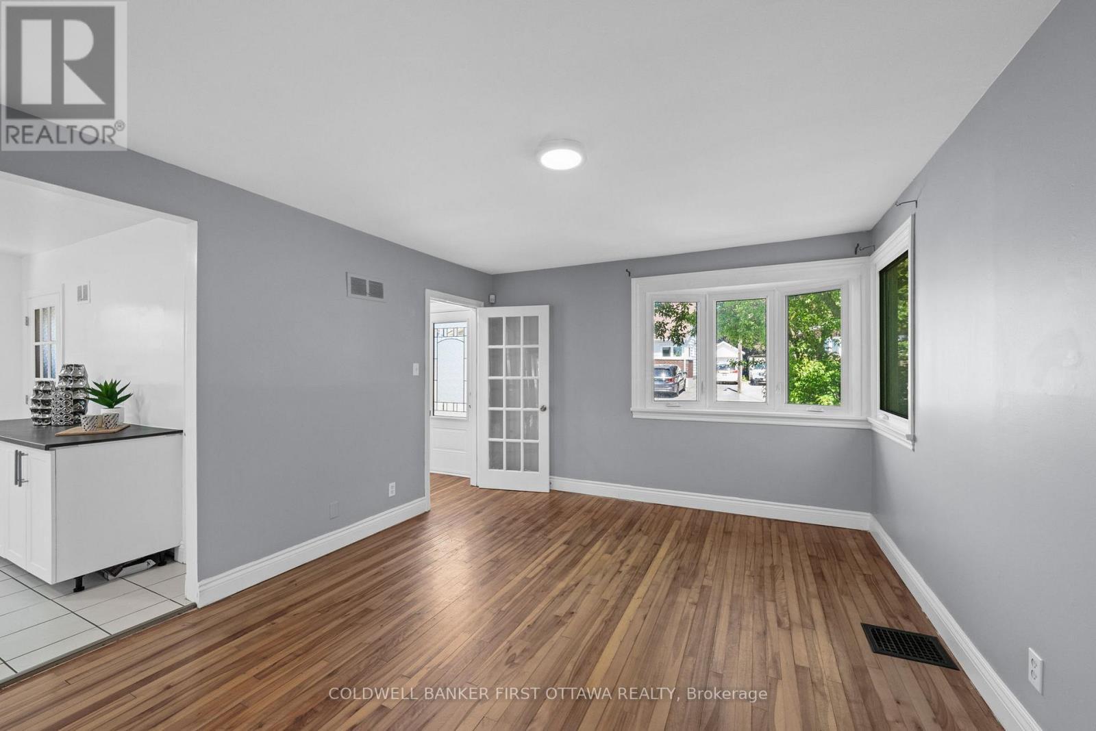 Bright front corner windows for natural light. - 1246 Kitchener Avenue, Ottawa, ON