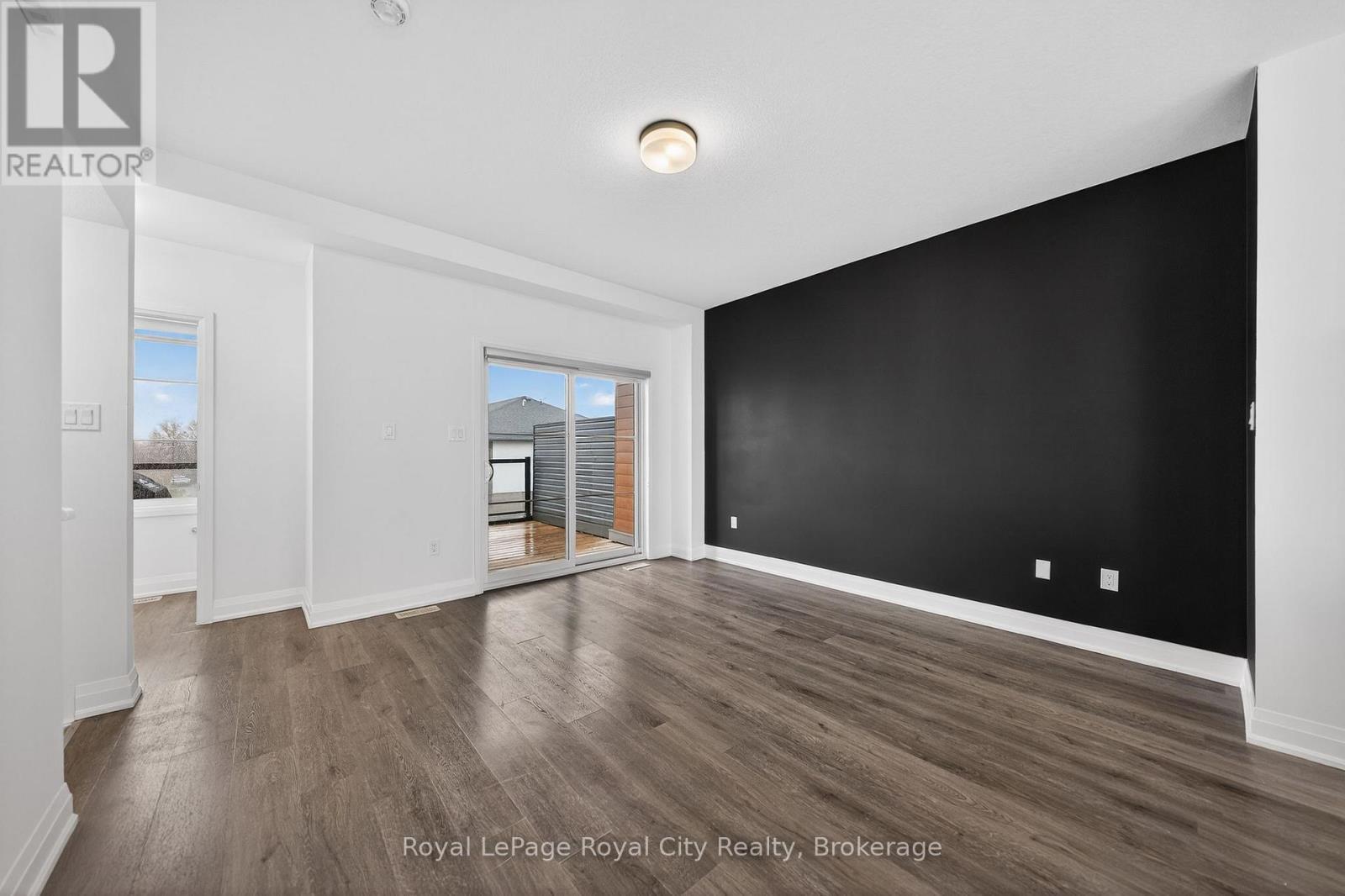 Living Room with sliders to terrace - 150 Huron Street, Guelph (St. Patrick'S Ward), ON - Indoor Photo Showing Other Room
