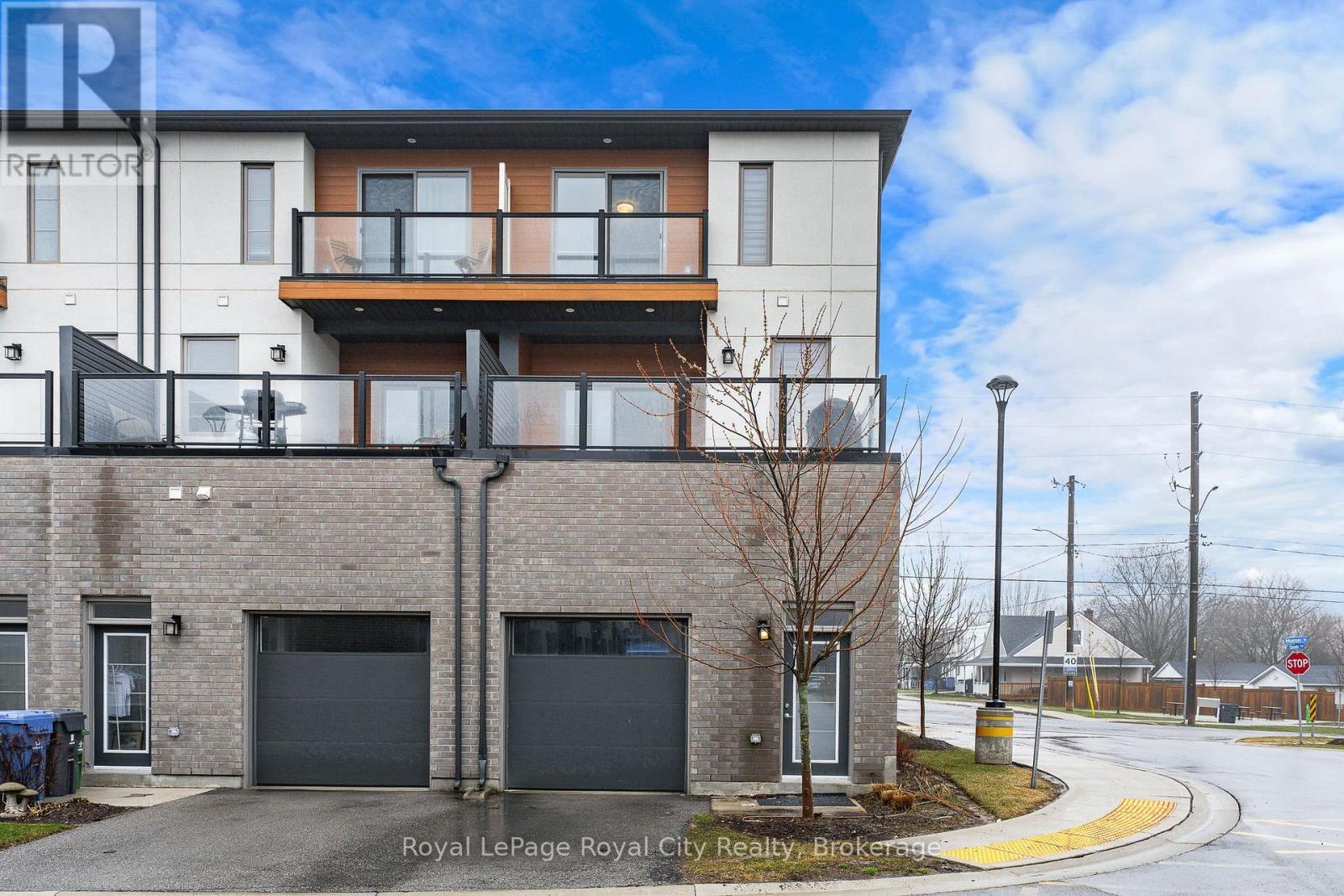 Back Entrance and Garage - 150 Huron Street, Guelph (St. Patrick'S Ward), ON - Outdoor With Balcony With Facade