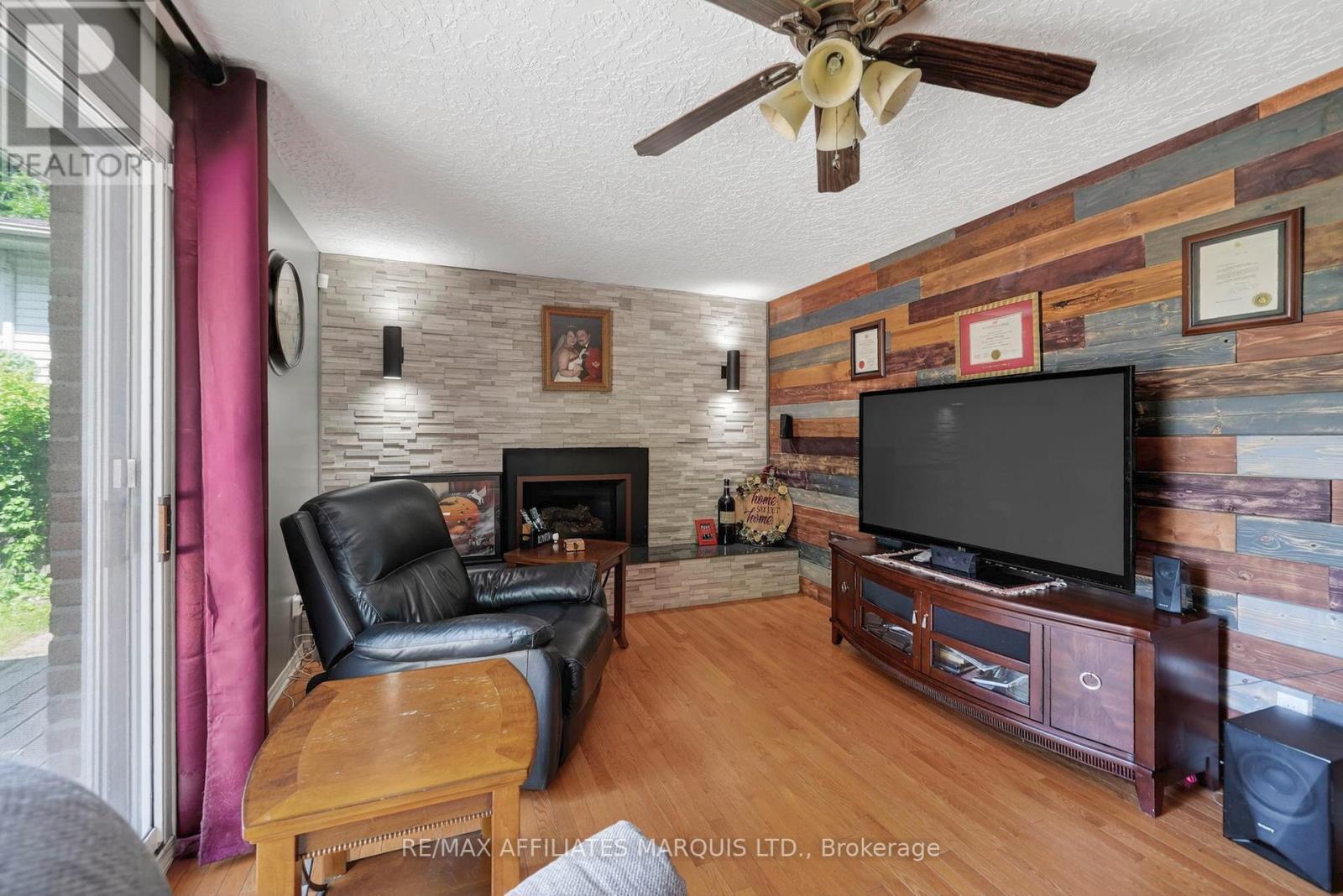 1329 Patricia Place, Cornwall, ON - Indoor Photo Showing Other Room With Fireplace
