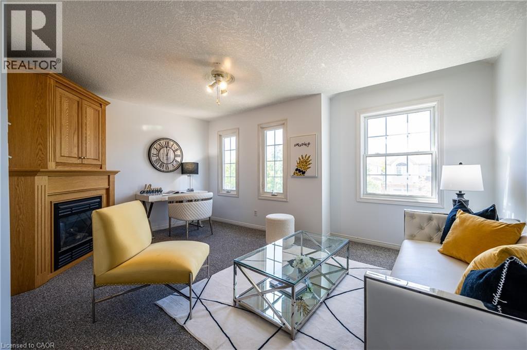 610 South Haven Drive, Waterloo, ON - Indoor Photo Showing Living Room With Fireplace
