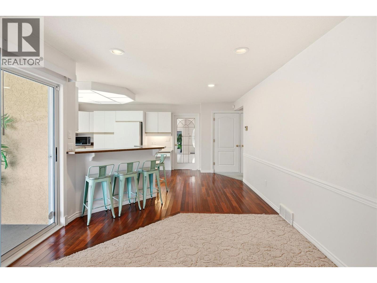 Cozy family area off the kitchen. - 756 Springrose Way, Kelowna, BC