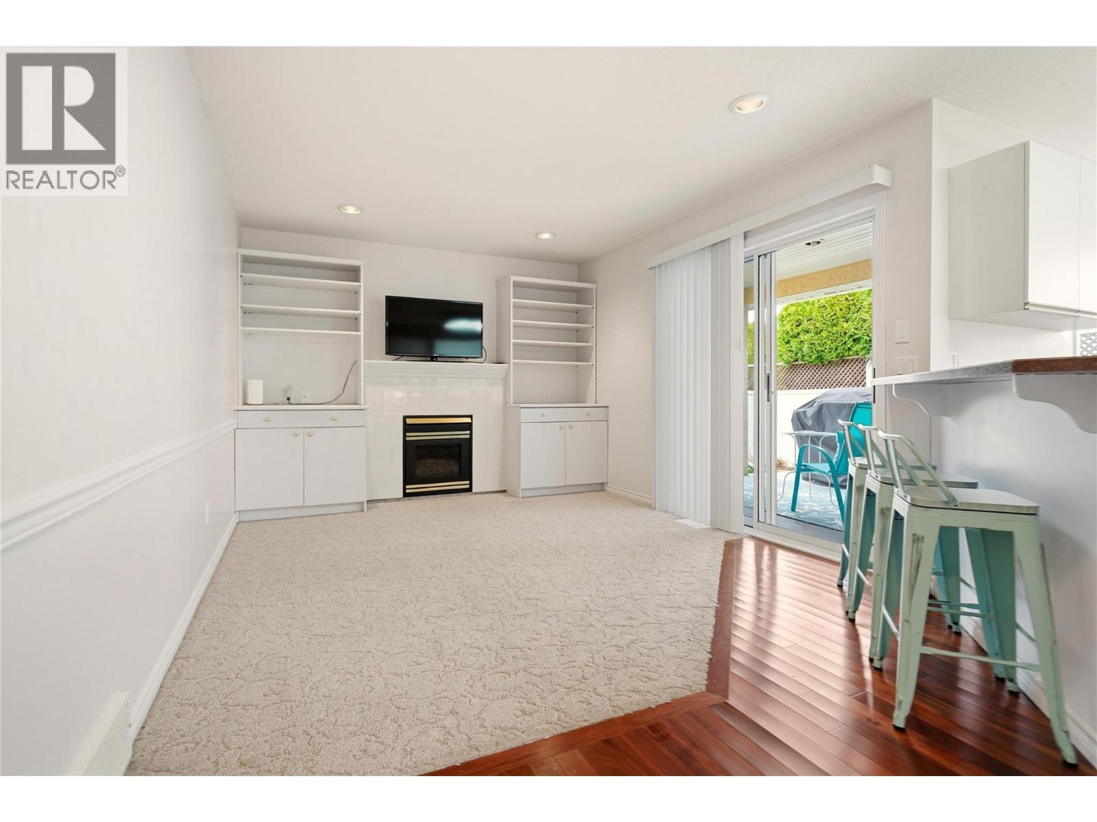 Cozy family area off the kitchen. - 756 Springrose Way, Kelowna, BC
