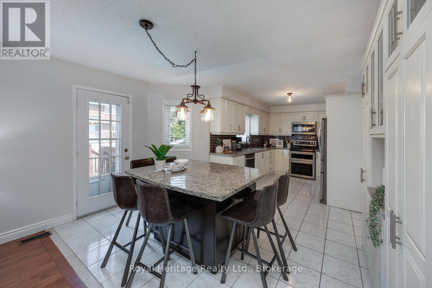 KITCHEN ISLAND - 16 Donald Wilson Street, Whitby (Rolling Acres), ON - Indoor Photo Showing Dining Room