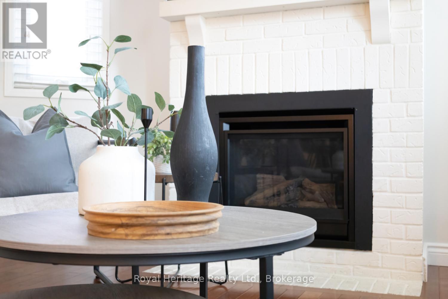 FAMILY ROOM - 16 Donald Wilson Street, Whitby (Rolling Acres), ON - Indoor With Fireplace