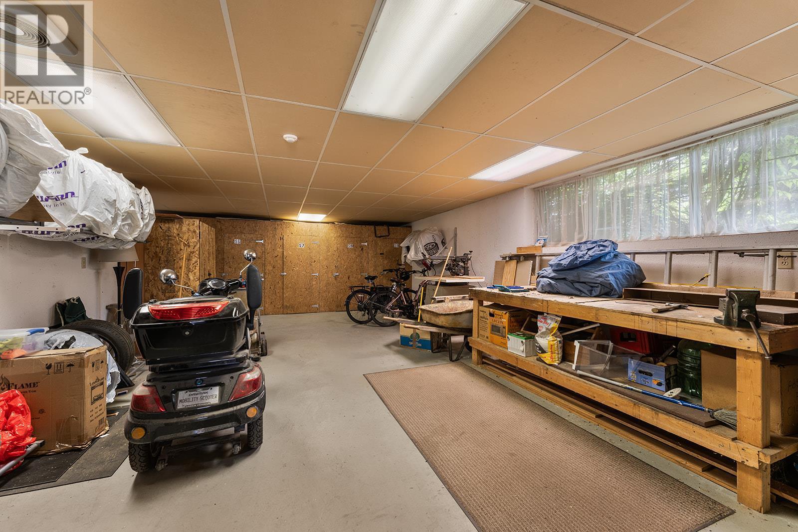 Access to Workshop!!! - 1534 Lawrence Avenue Unit# 304, Kelowna, BC - Indoor Photo Showing Basement