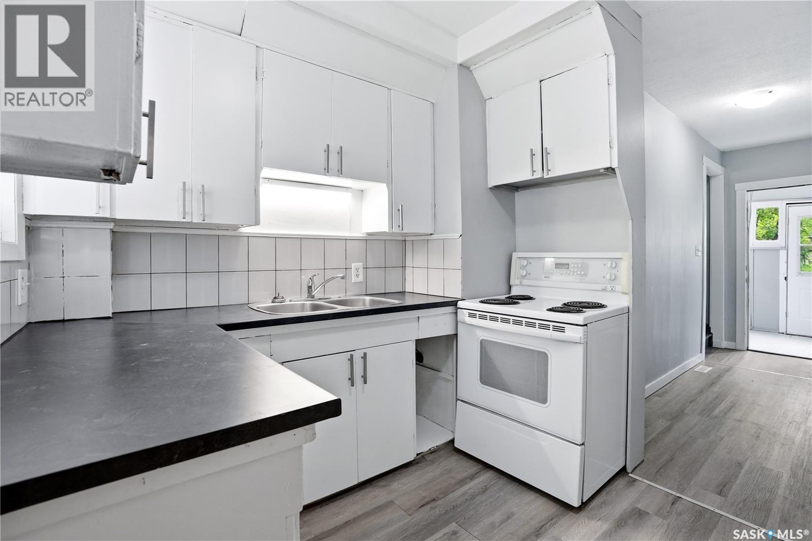 735 Wascana Street, Regina, SK - Indoor Photo Showing Kitchen With Double Sink