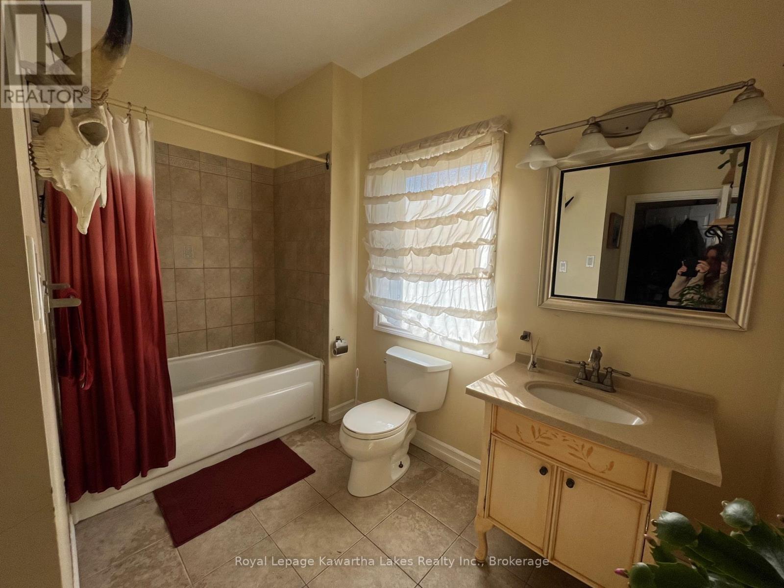 Main Floor Washroom off Mudroom & Kitchen - 2435 Elm Tree Road, Kawartha Lakes (Fenelon), ON