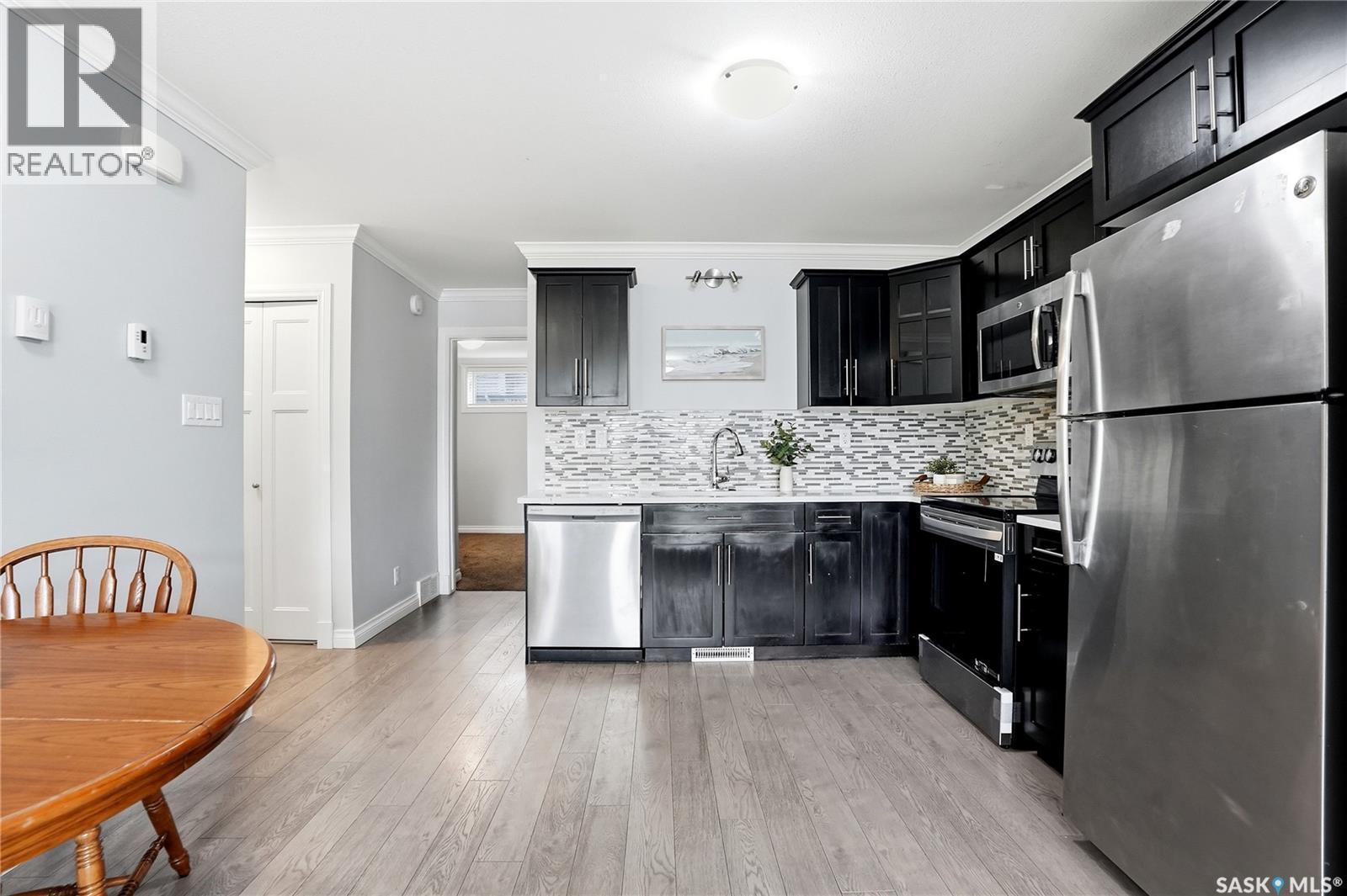 409 225 Hassard Close, Saskatoon, SK - Indoor Photo Showing Kitchen With Stainless Steel Kitchen With Upgraded Kitchen
