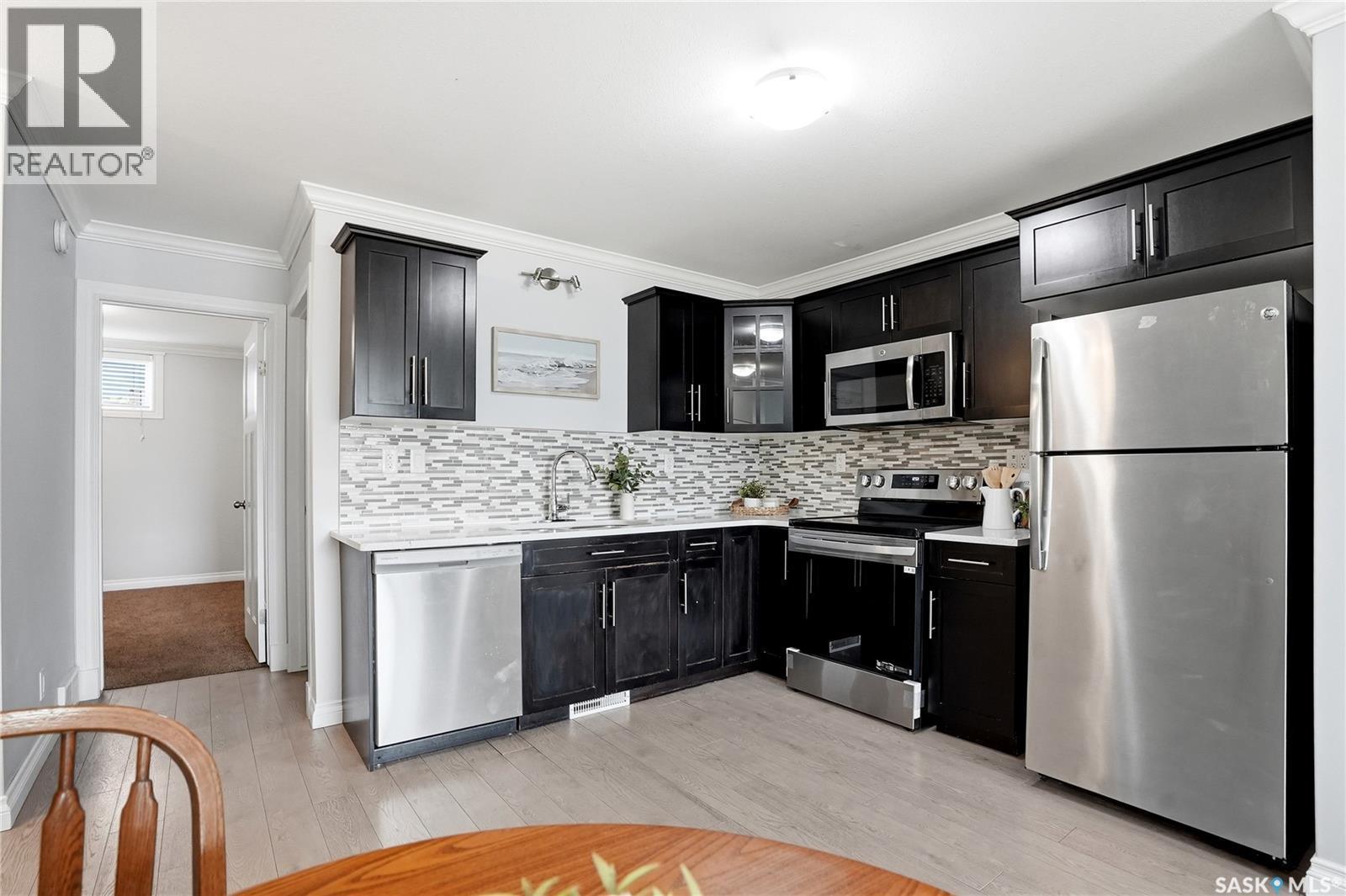 409 225 Hassard Close, Saskatoon, SK - Indoor Photo Showing Kitchen With Stainless Steel Kitchen With Upgraded Kitchen