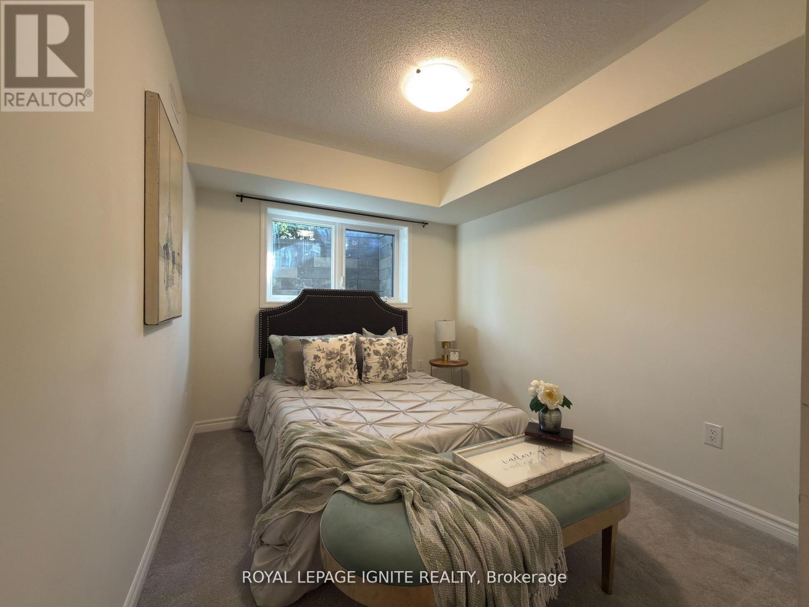 119 - 1081 Danforth Road, Toronto, ON - Indoor Photo Showing Bedroom