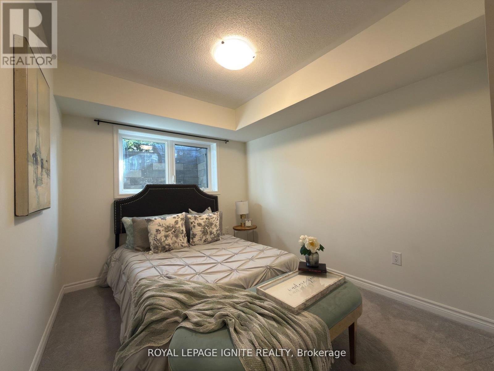 119 - 1081 Danforth Road, Toronto, ON - Indoor Photo Showing Bedroom