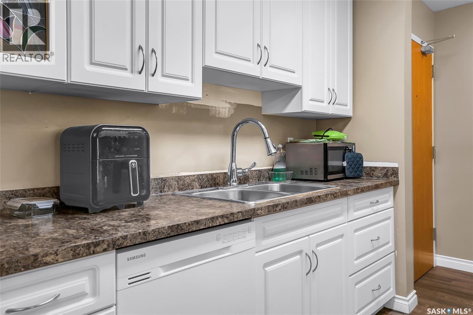 612 310 Stillwater Drive, Saskatoon, SK - Indoor Photo Showing Kitchen With Double Sink