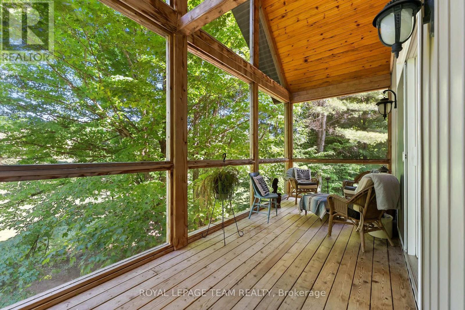 A frame screened in porch - 1622 Concession 4B, Lanark Highlands, ON - Outdoor With Deck Patio Veranda With Exterior