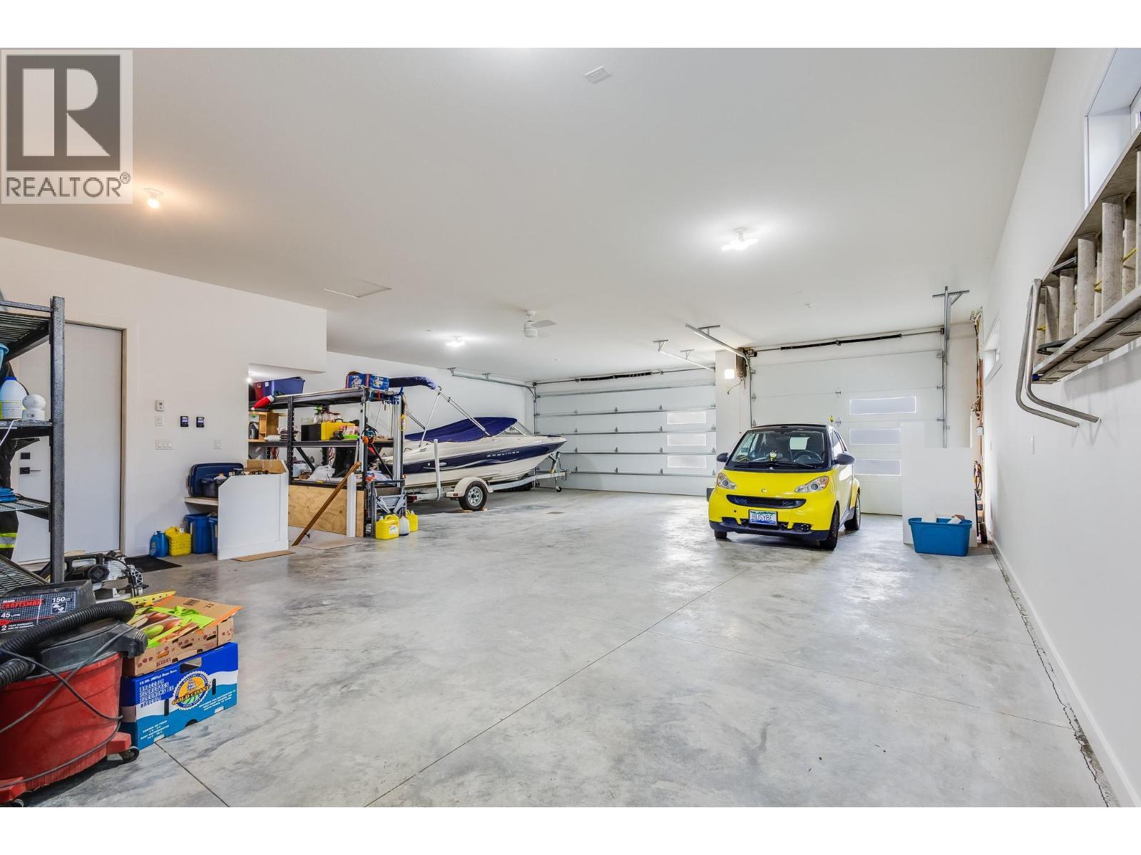 Oversized Triple Car Garage w 9ft Doors - 7235 Dunwaters Road, Kelowna, BC