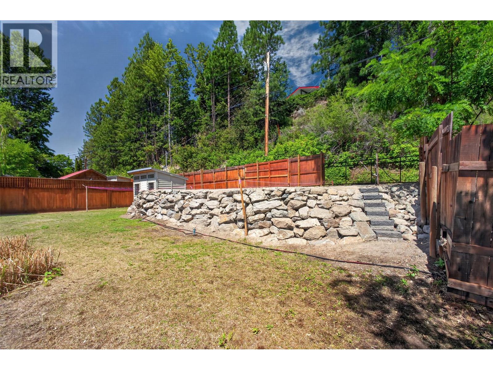 Still a decent amount of yard after construction! - 4535 Mill Road, Naramata, BC