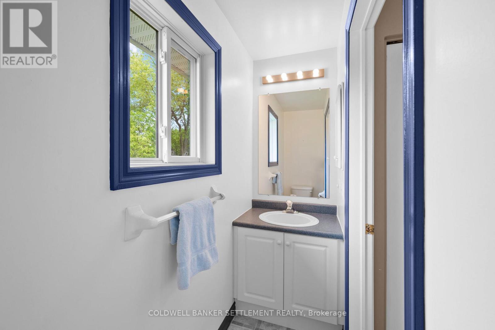 Powder room on main level - 42 Berry Park Lane, Rideau Lakes, ON