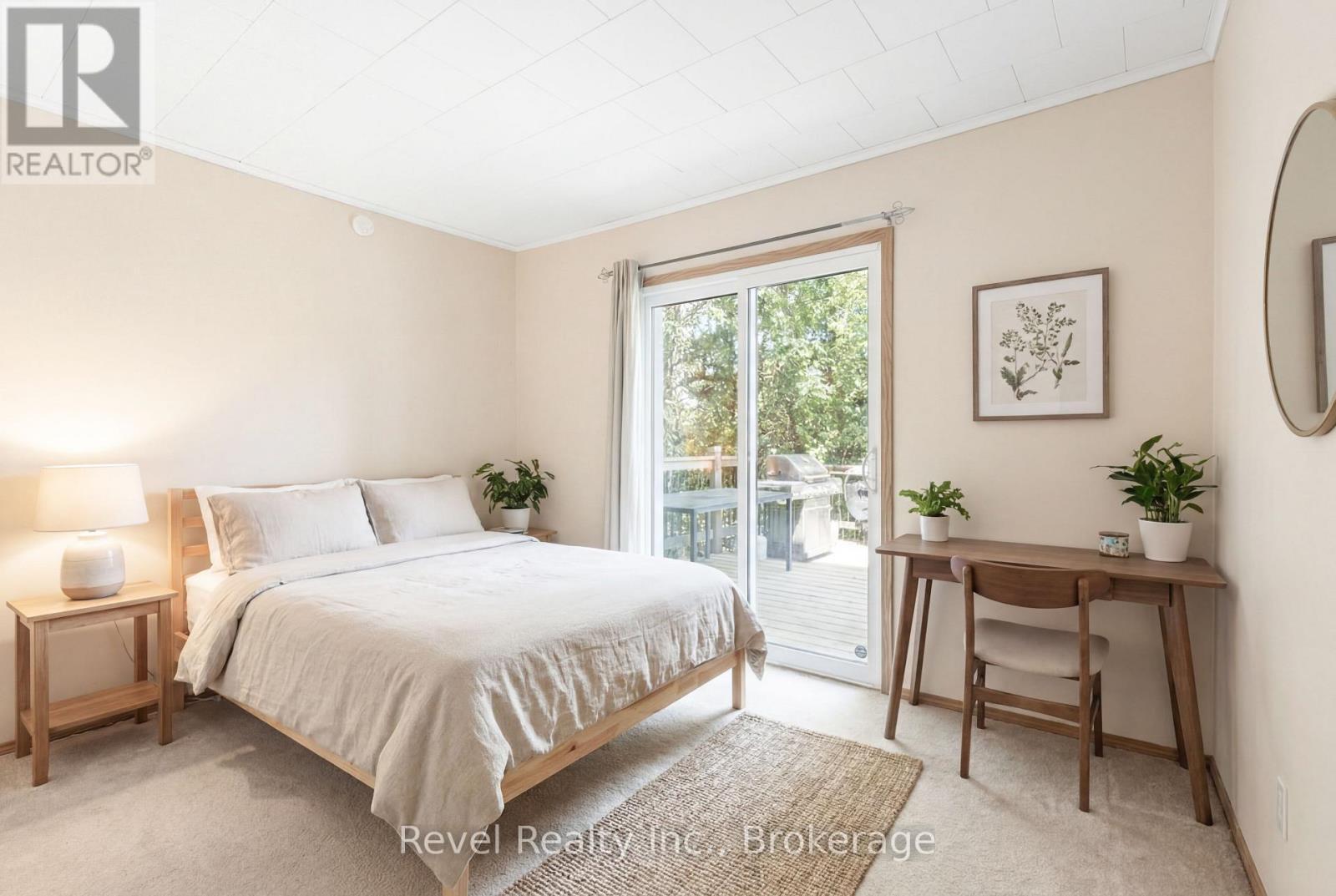 Main Floor Bedroom W/Walk Out To Deck & Lake - 75 Meachin Drive, Kawartha Lakes (Verulam), ON