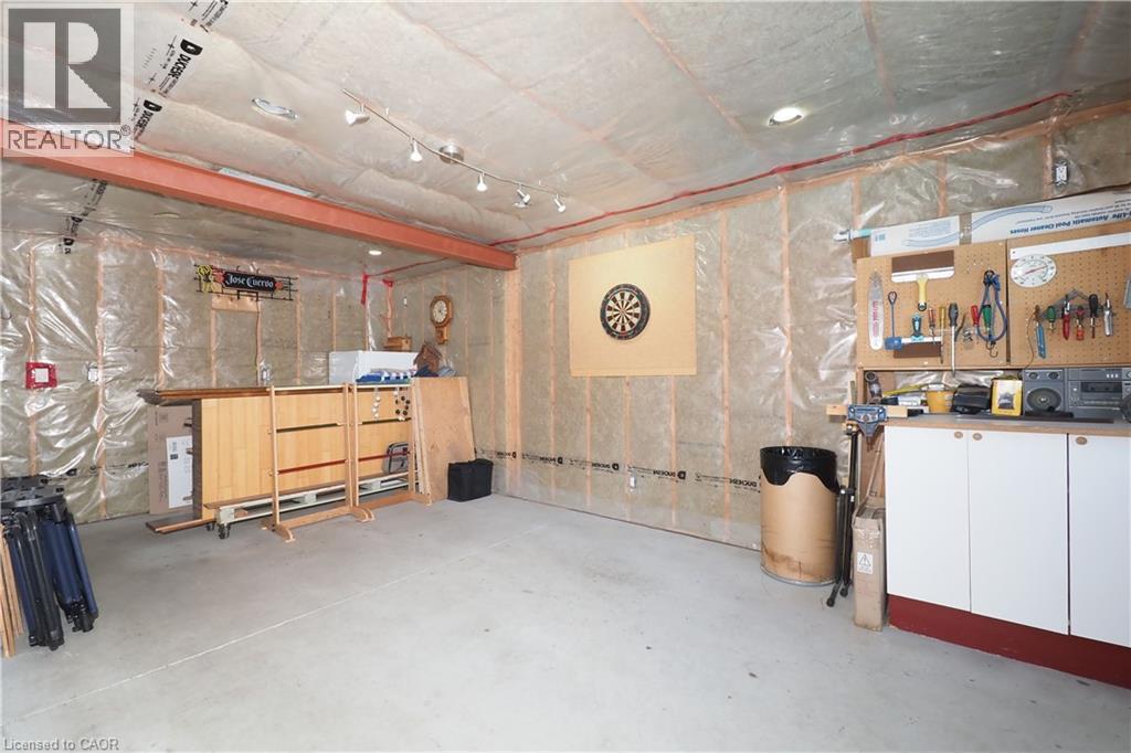This is the ""Club House"". Insulated, pre-wired for speakers, internet and is currently heated (baseboard heaters). - 26 Woodhaven Road, Kitchener, ON