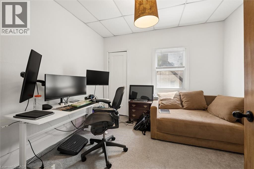 Carpeted room featuring a drop ceiling with recessed lighting - 149 Young Street, Kitchener, ON - Indoor Photo Showing Office