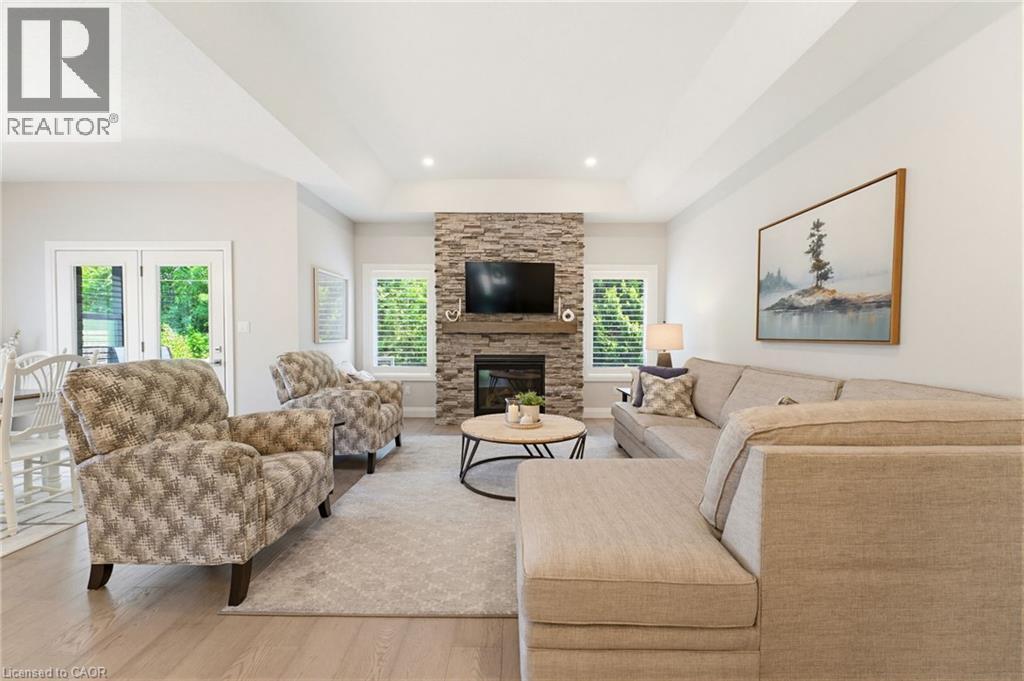 560 Rogers Road, Listowel, ON - Indoor Photo Showing Living Room With Fireplace