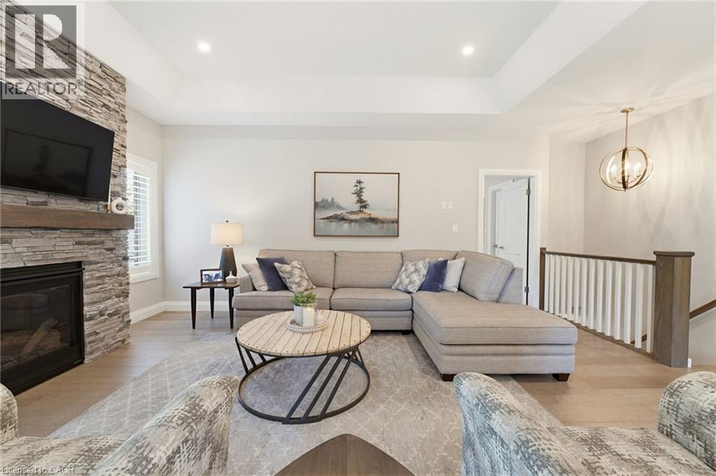 560 Rogers Road, Listowel, ON - Indoor Photo Showing Living Room With Fireplace