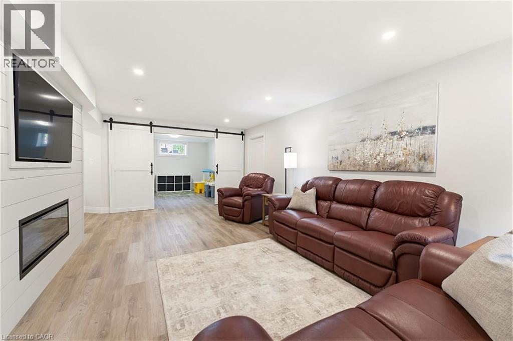 560 Rogers Road, Listowel, ON - Indoor Photo Showing Living Room With Fireplace