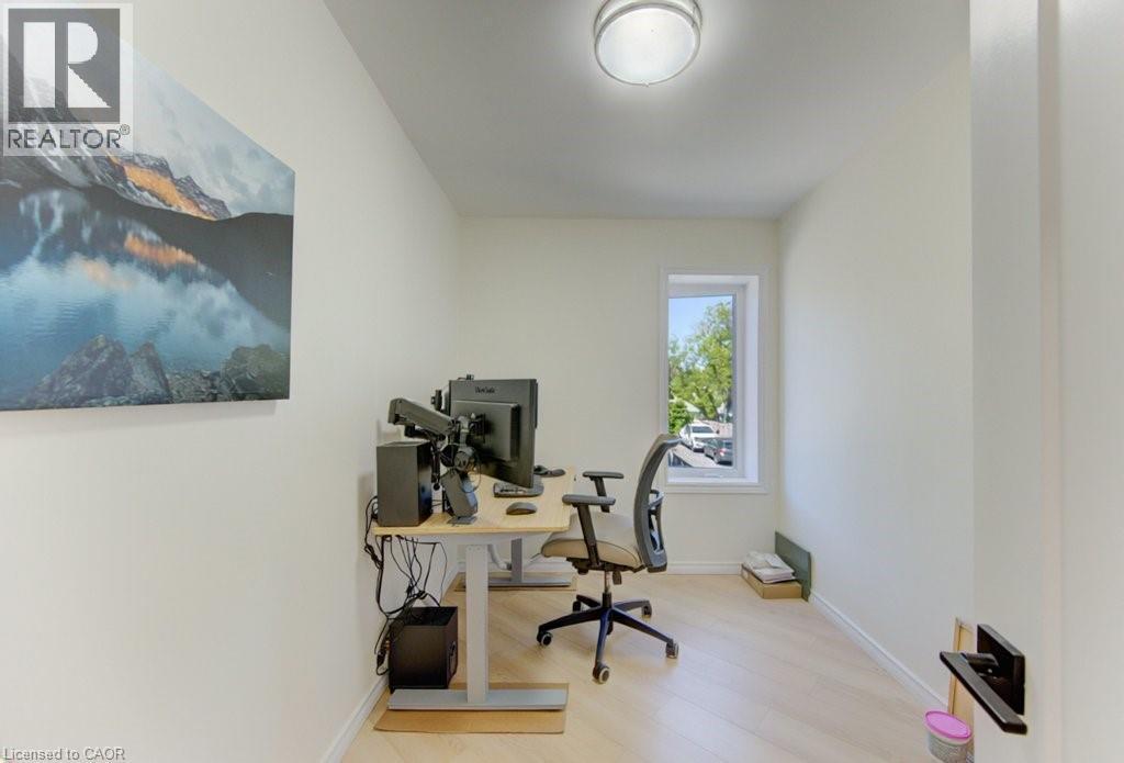 Dedicated room featuring light wood-finish flooring, neutral wall paint, and a single window - 11 Davidson Street, Cambridge, ON