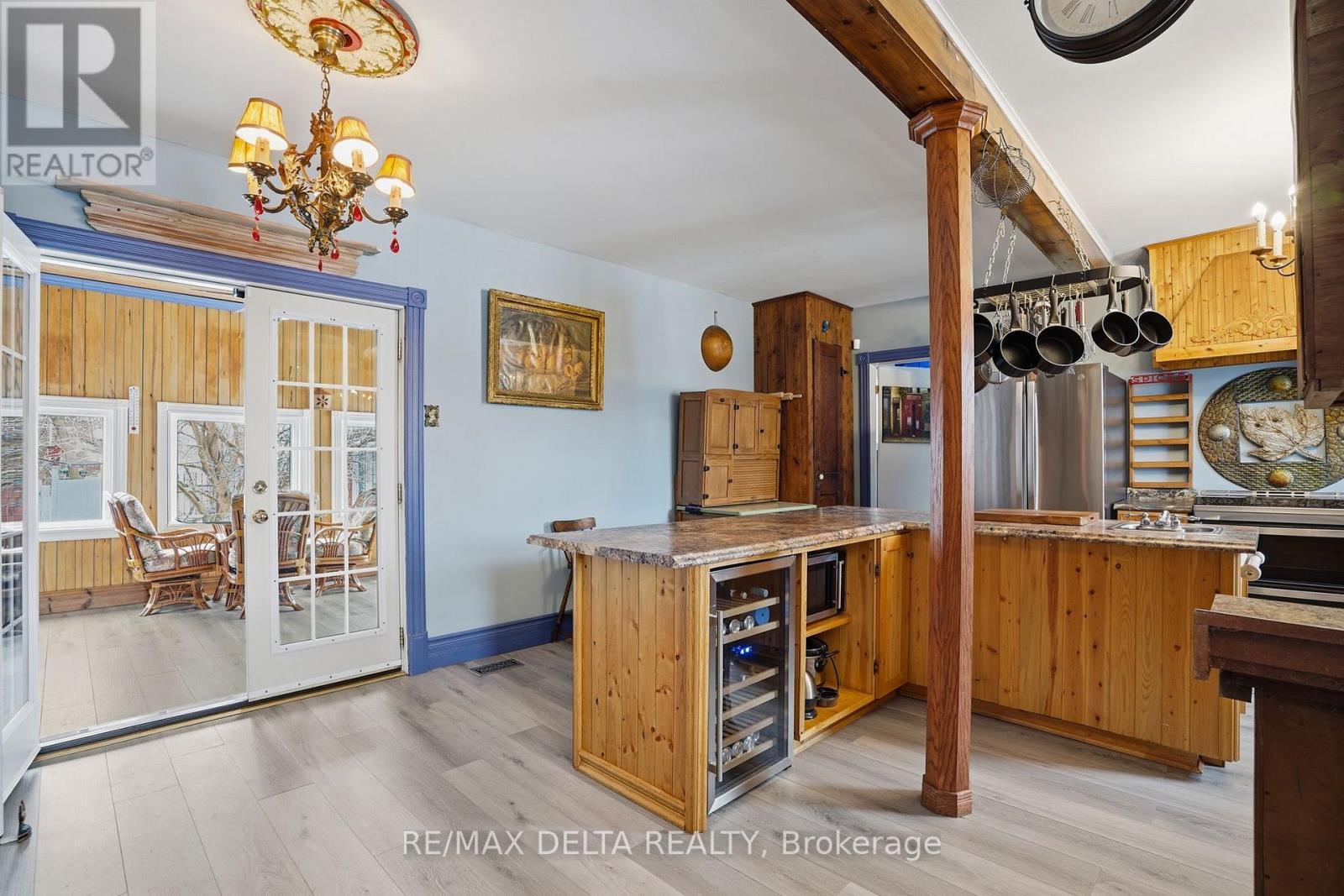 Kitchen leads to sun room. - 132 High Street, Champlain, ON