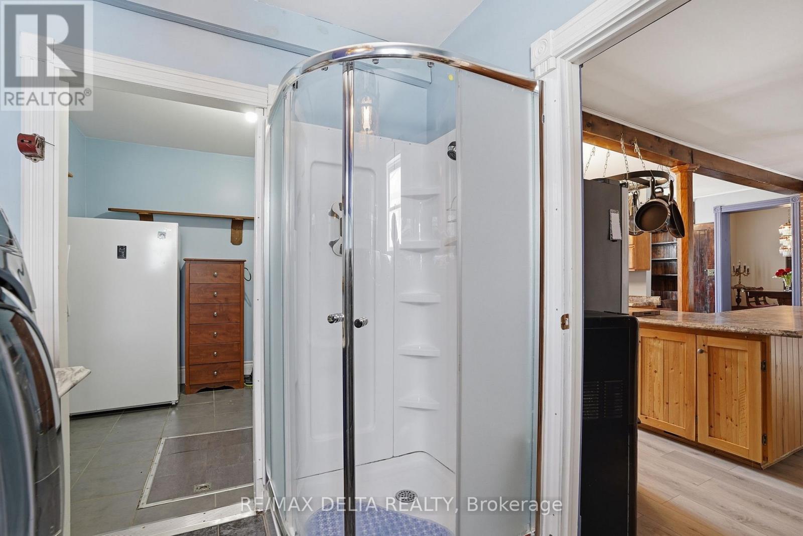 Shower in laundry room, off kitchen. - 132 High Street, Champlain, ON