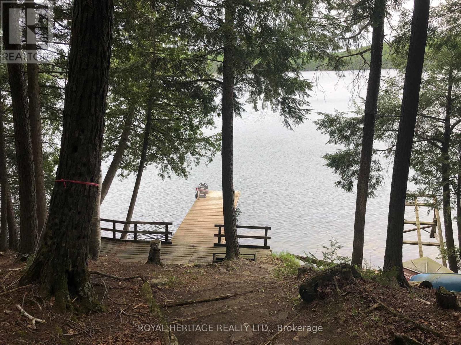 **Two Docks (One Is 5 Years Old With A Winch) - 1160 Sunset Strip Lane, Frontenac, ON - Outdoor With Body Of Water With View