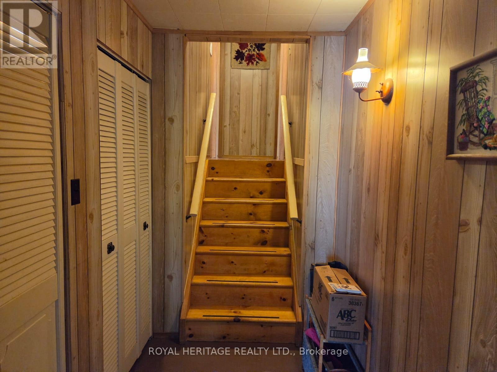 **Stairs To Other 4 Bedrooms** - 1160 Sunset Strip Lane, Frontenac, ON - Indoor Photo Showing Other Room