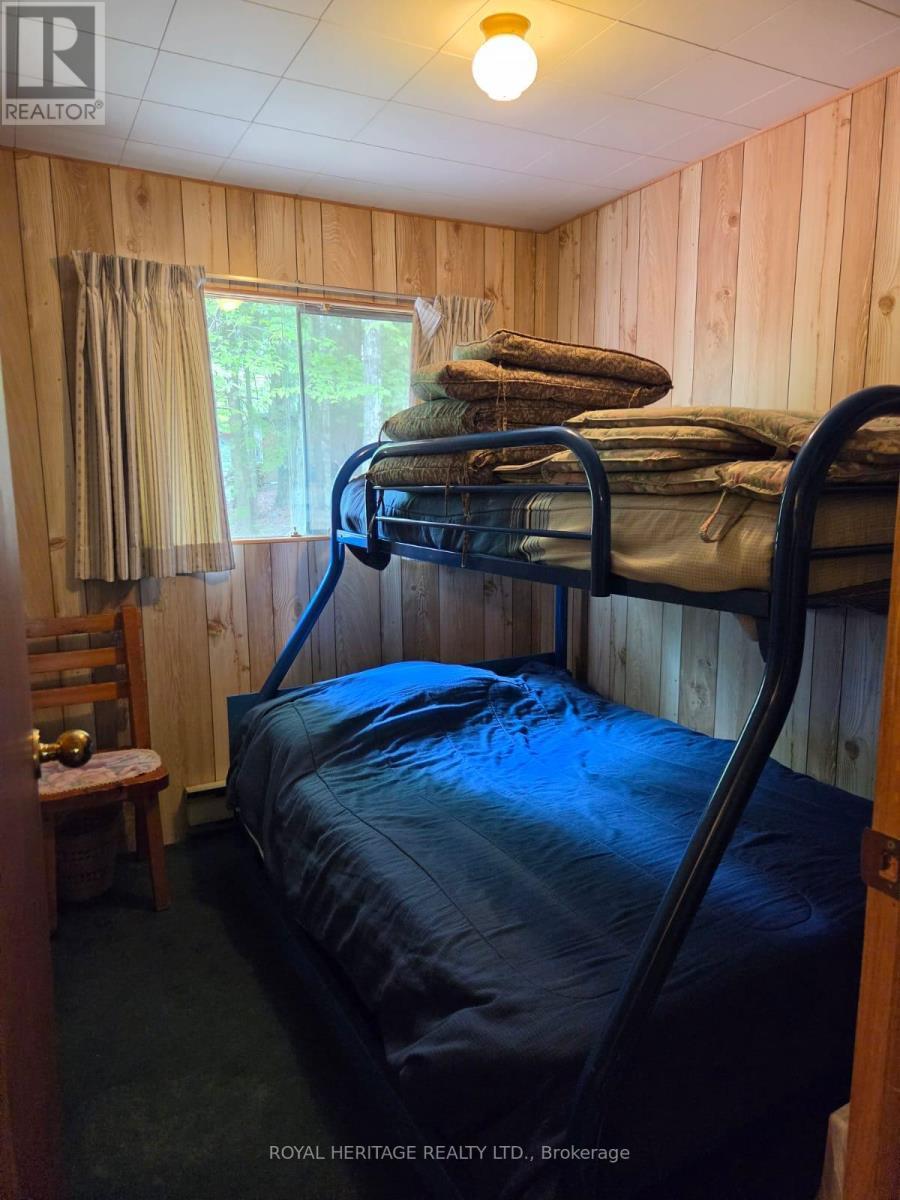 **Bedroom 6** - 1160 Sunset Strip Lane, Frontenac, ON - Indoor Photo Showing Other Room