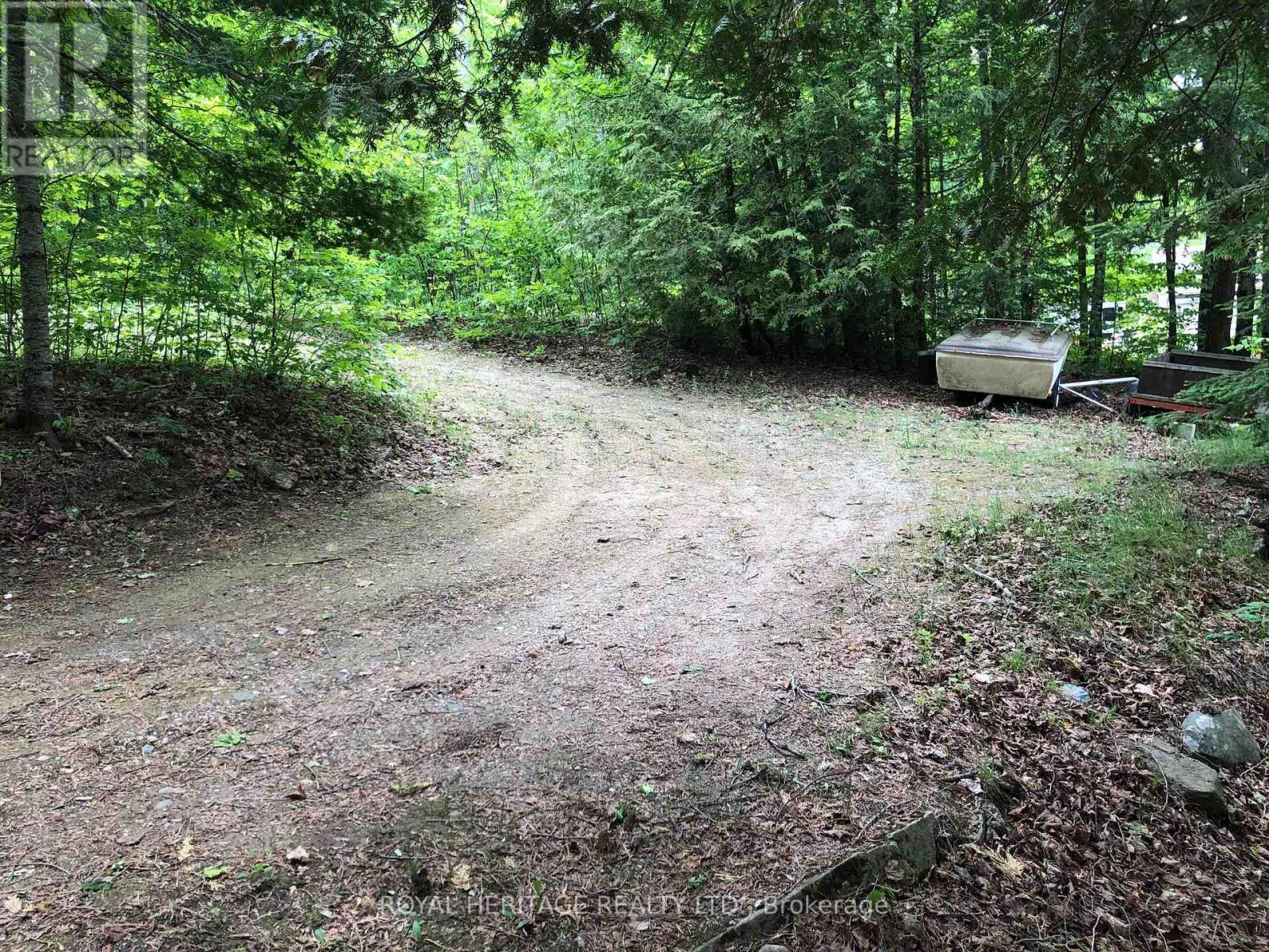**5 Car Parking In Circular Drive** - 1160 Sunset Strip Lane, Frontenac, ON - Outdoor