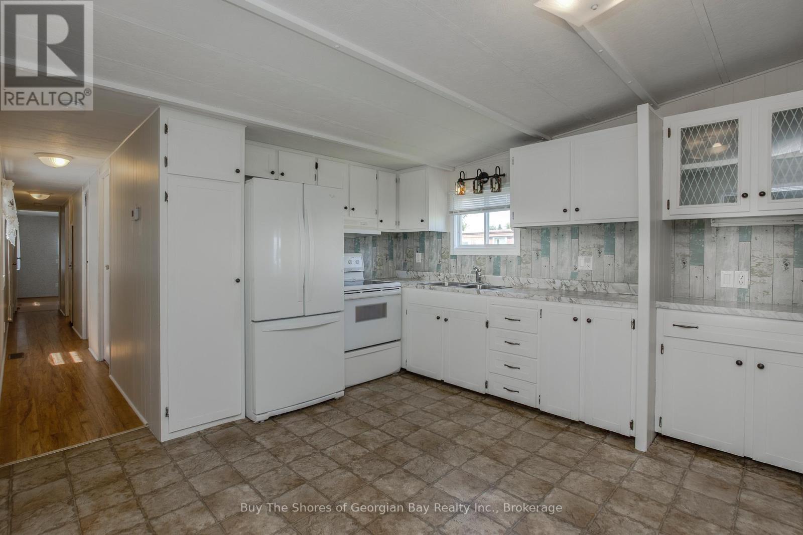 10 Maple Lane, Midland, ON - Indoor Photo Showing Kitchen With Double Sink