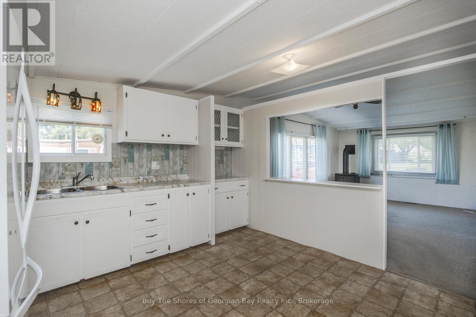 10 Maple Lane, Midland, ON - Indoor Photo Showing Kitchen With Double Sink