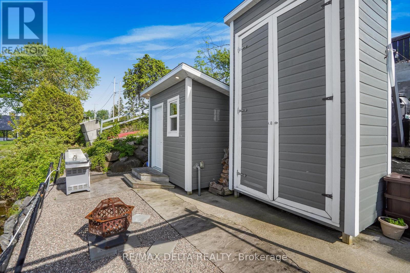 Tall shed to store kayaks. - 162 Front Road W, Champlain, ON