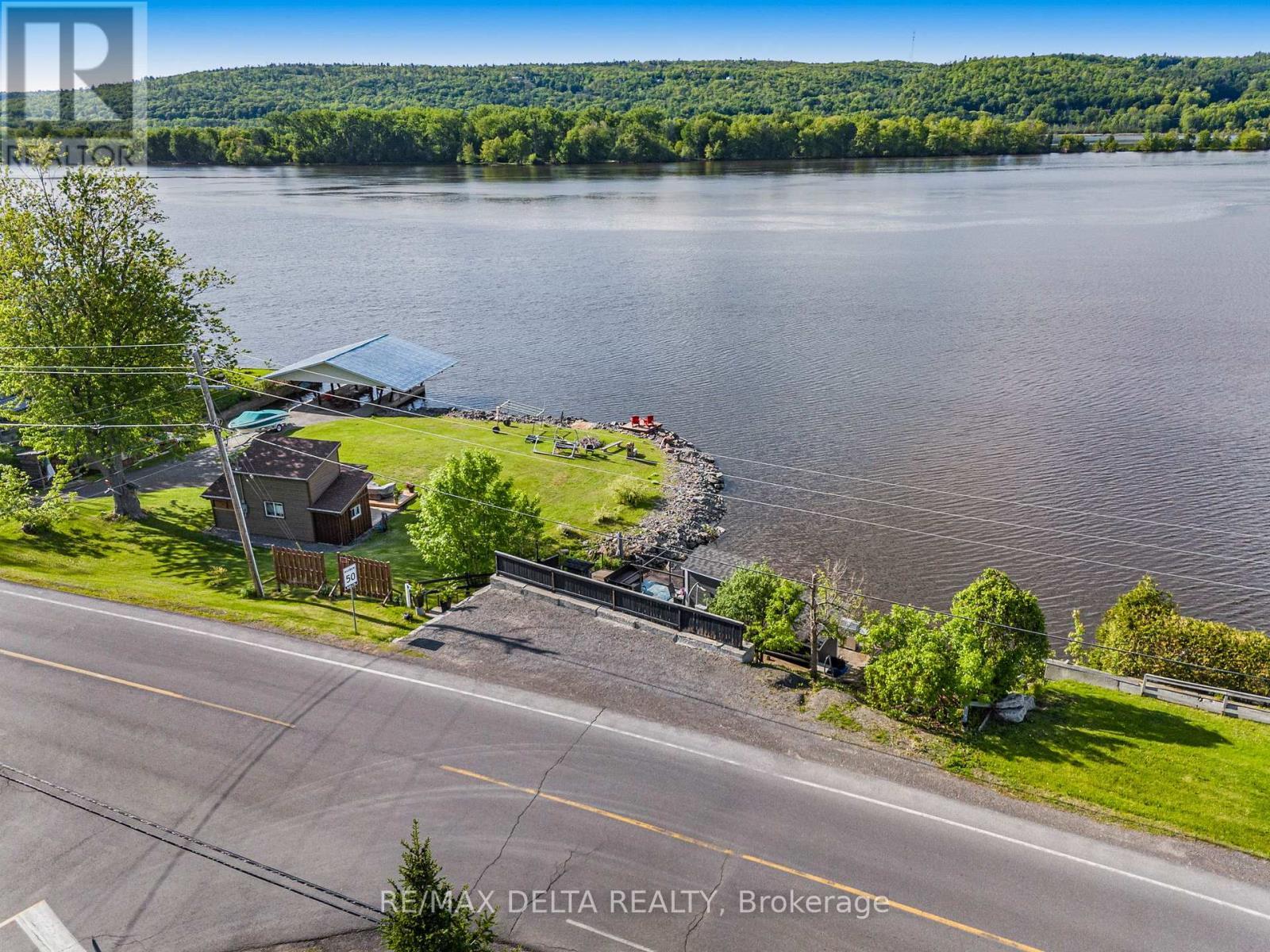 View of upper level, parking area. - 162 Front Road W, Champlain, ON