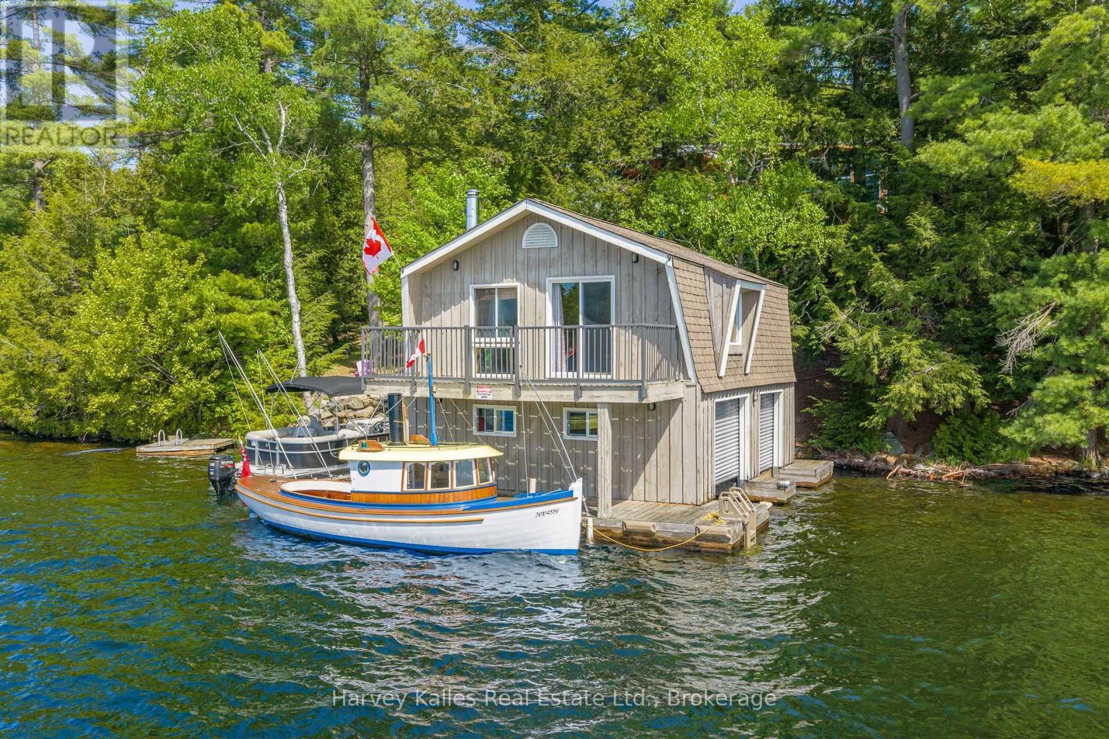 2 slip boathouse with living space above - 43 Houston Lane, Seguin, ON