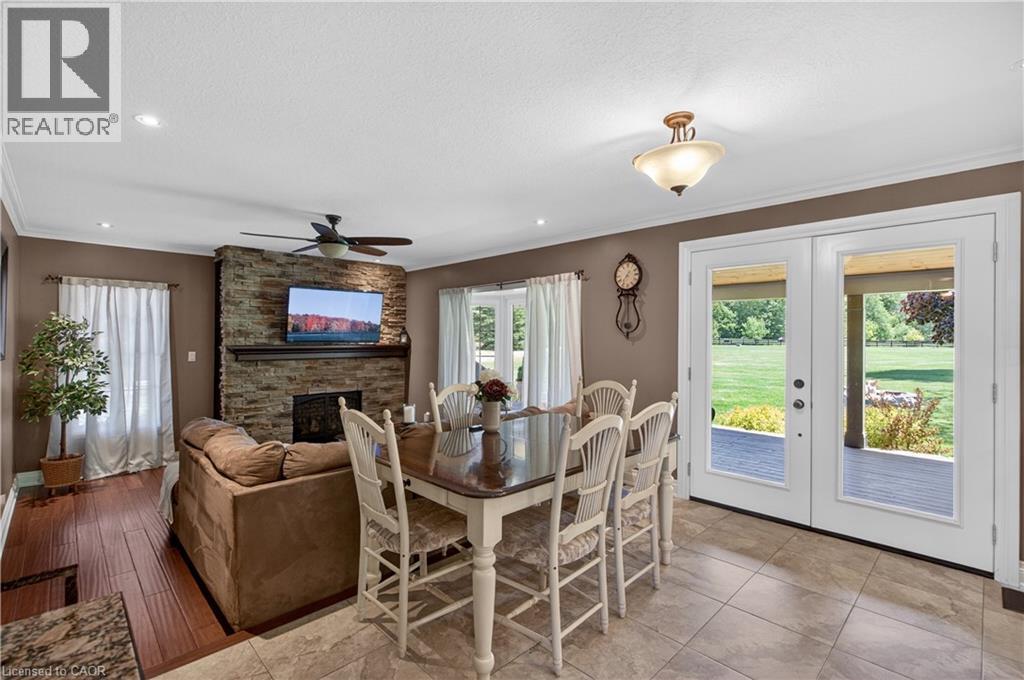 2264 Britannia Road, Burlington, ON - Indoor Photo Showing Dining Room With Fireplace