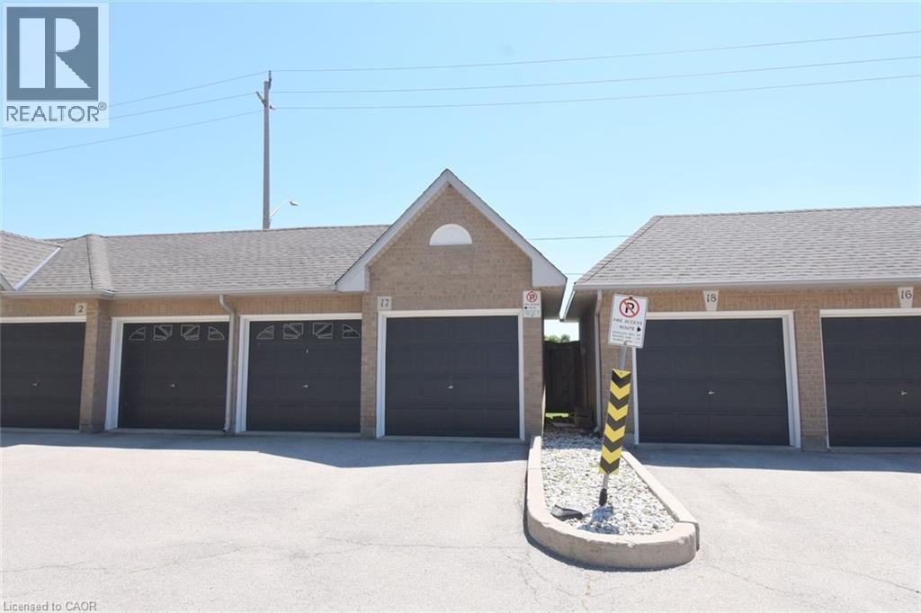 Garage. Two doors to two bays, left from median. - 2 Harbour Drive Unit# 17, Stoney Creek, ON