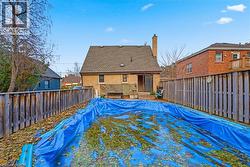View of pool featuring a fenced backyard and a wooden deck -